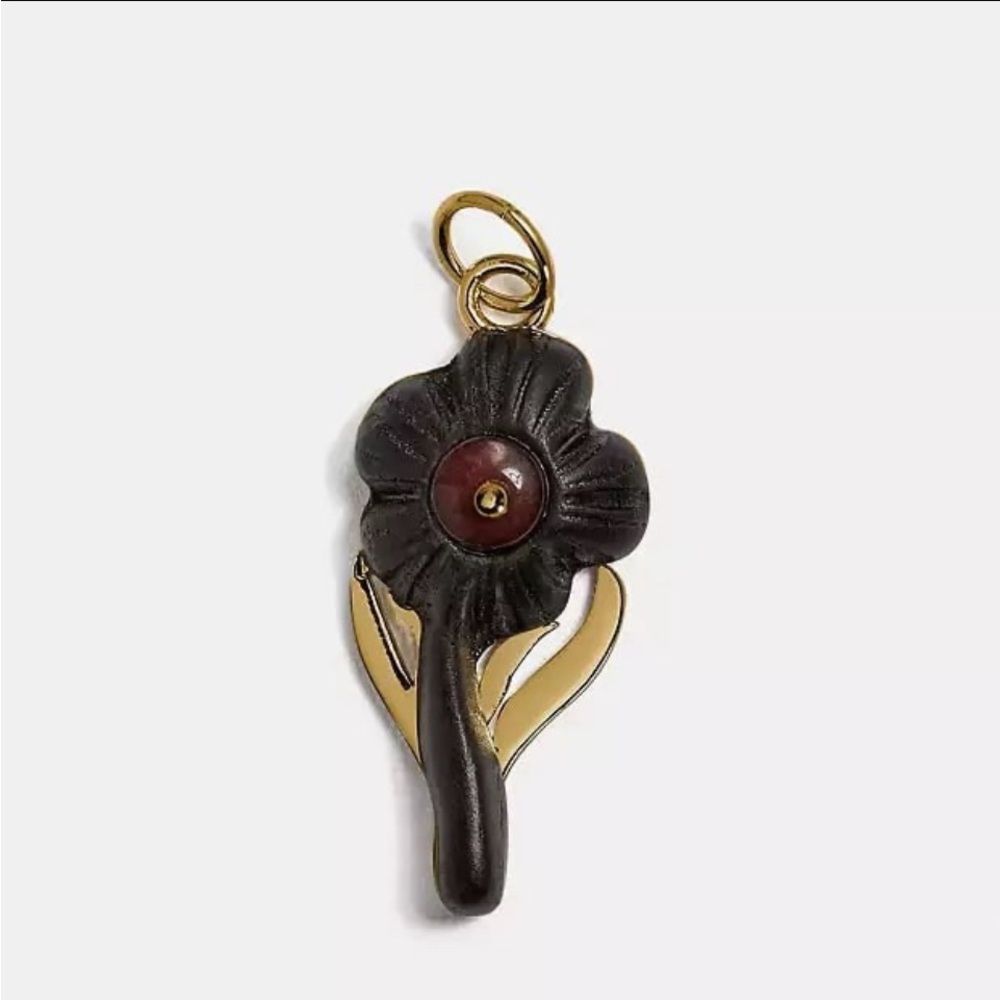 Coach  Black and Gold Flower Pendant